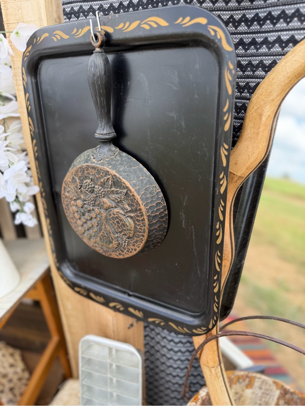 Black and Gold Decorative Wall Plaque with Carved Hanging Pan